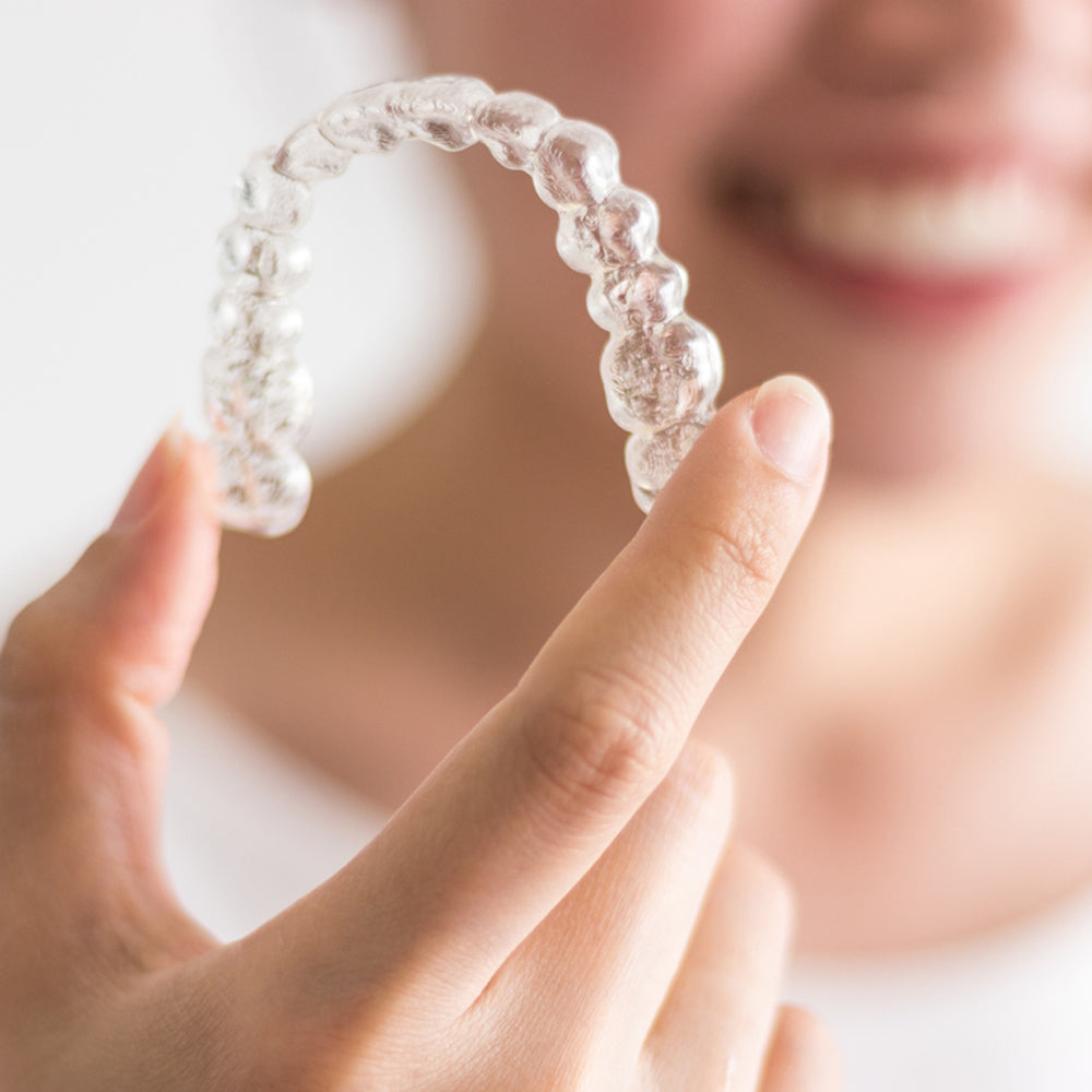 Close up of an Invisalign aligner